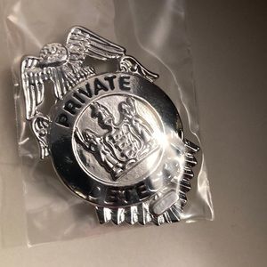 Small nickel plated detective badge for costume or private detective
